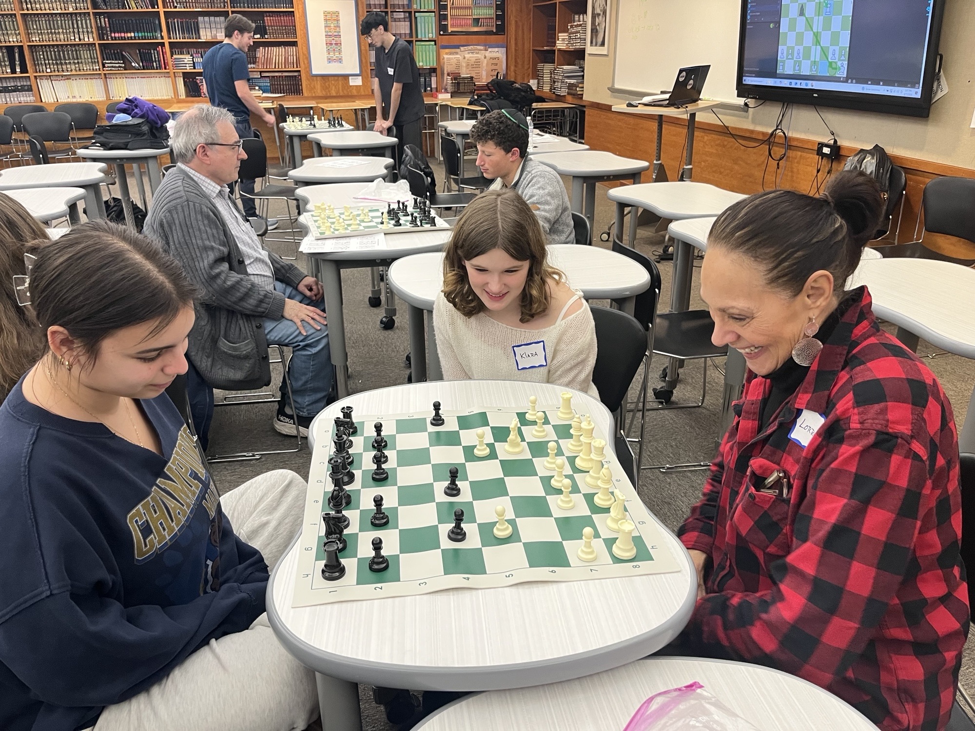 Intergenerational chess playing brings an opportunity to learn, enrich the mind, and bring joy to older adults and teens alike.