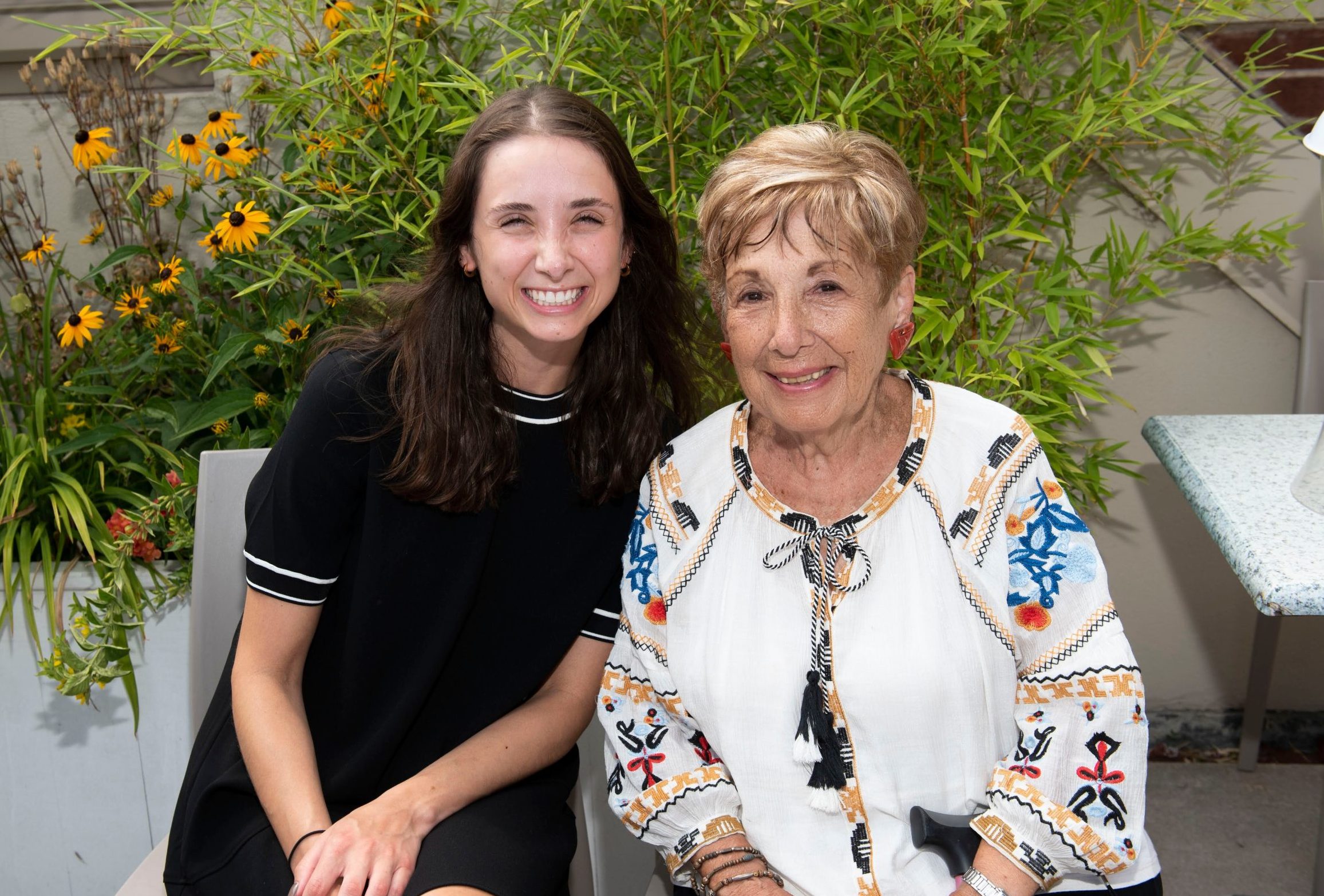 DOROT team member smiling with an older adult.
