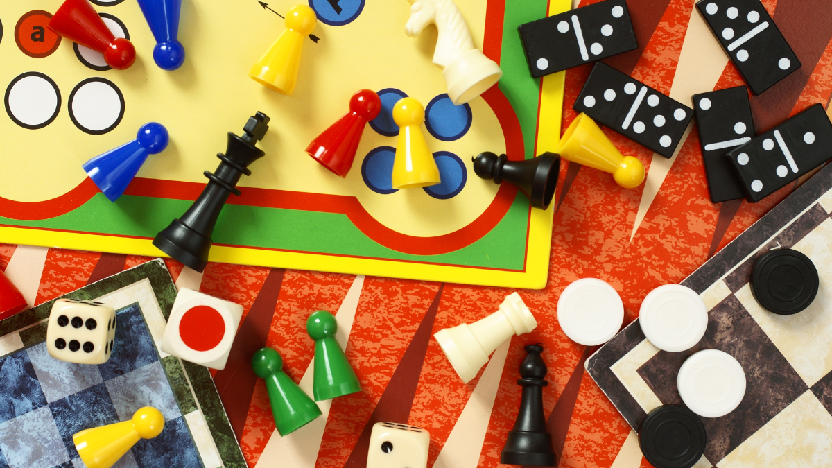 Board game pieces laid out on a table.